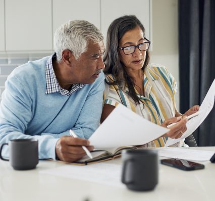 Couple reviewing financial documents