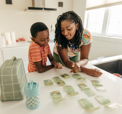 Mother and son counting money